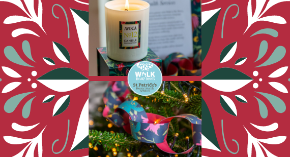 This image shows a Christmas candle and colourful paper chains designed by AVOCA in support of Walk in My Shoes.