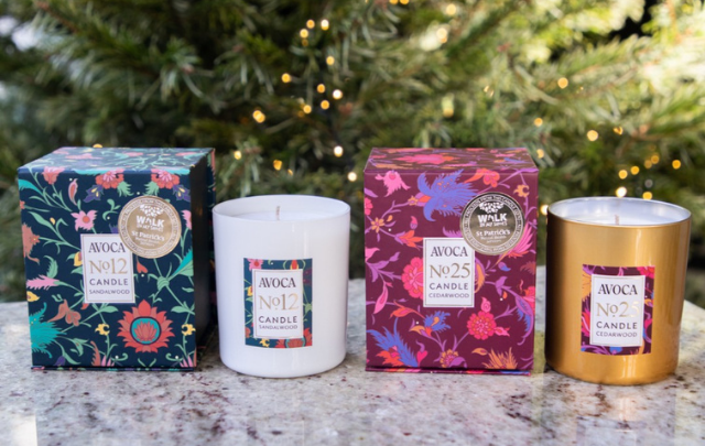This image shows the No 12 sandlewood scented candle and No 25 cedarwood scented candle from AVOCA, which it is donating proceeds of to support Walk in My Shoes mental health initiatives.