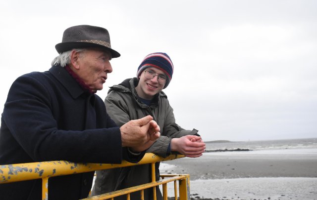 My Grandfather and I: photo of a young man talking with his grandfather; winner of the 2022/23 Frame of Mind photography competition.